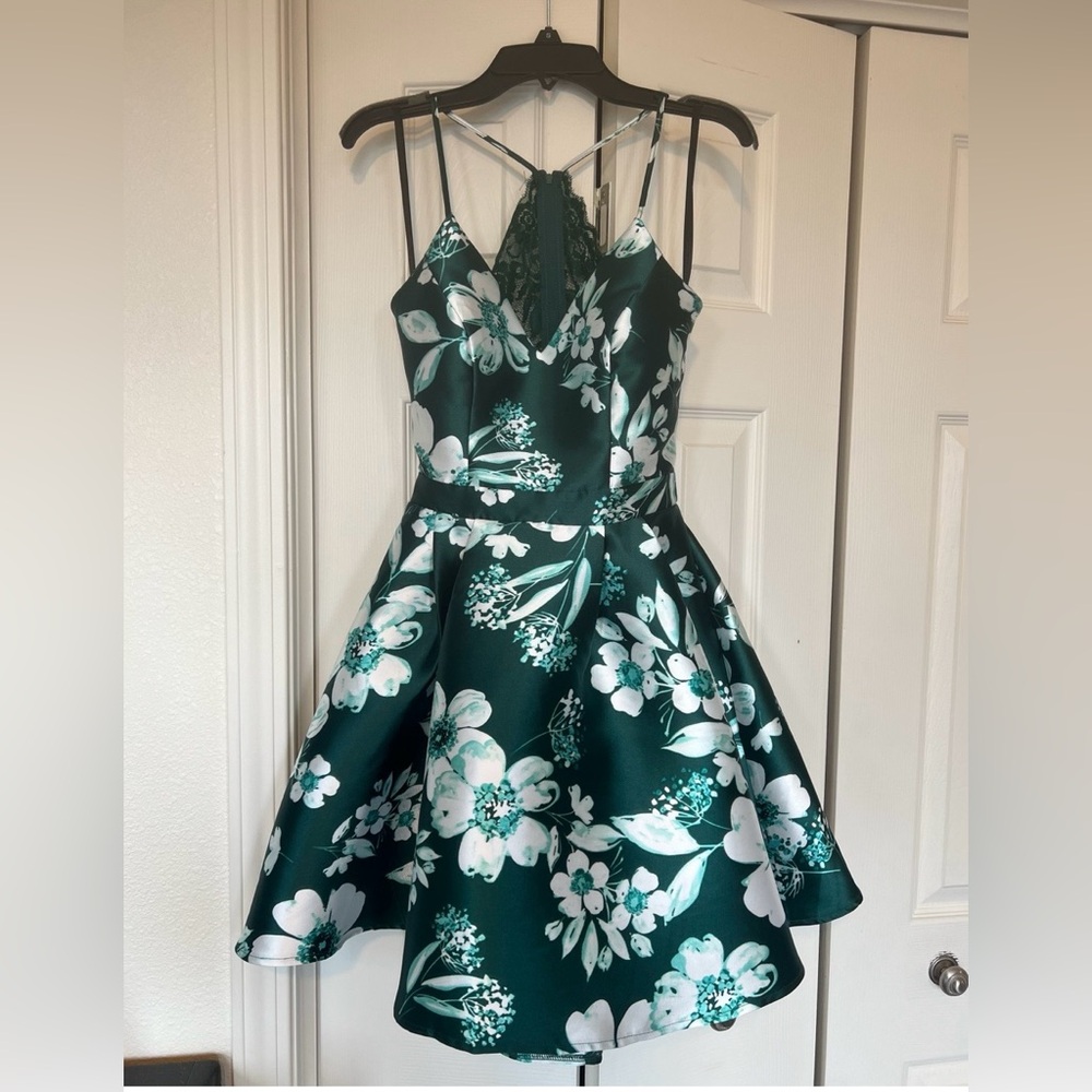 Green B Darlin homecoming dress with white flowers